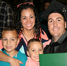 MC graduate celebrating with family