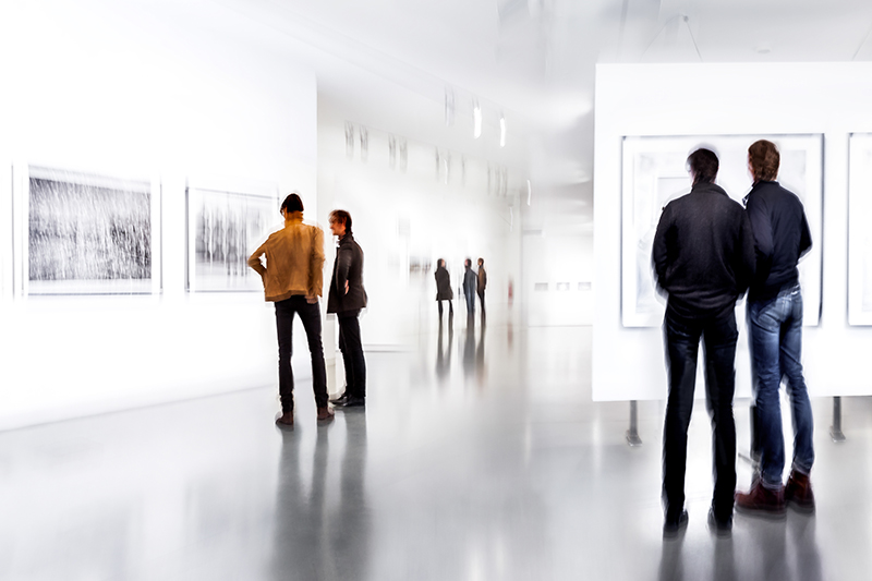 The image to use for this article. Listing image managed through RSS tab. People looking at art exhibit