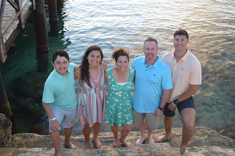 The image to use for this article. Listing image managed through RSS tab. Evie Gandy and her family vacationing in Cozumel, summer 2019.  Pictured from left to right are Maddox Gandy, Natalie Adams, Evie Gandy, Morgan Gandy and Nick Adams.