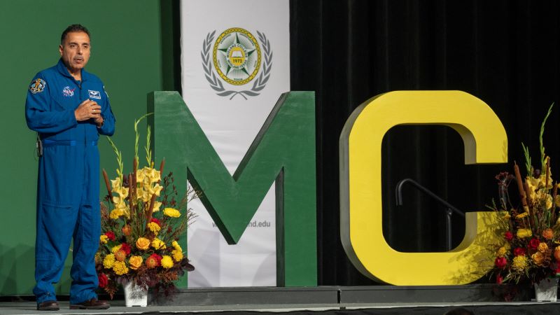 sjose hernandez next to MC sign