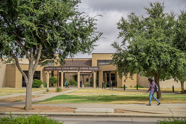 The image to use for this article. Listing image managed through RSS tab. Students walking in front of Aaron Medical Science Building on the main MC campus.